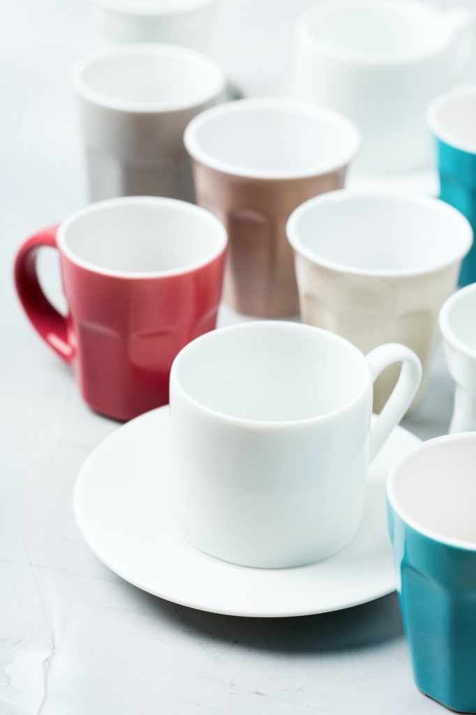 Complimentary Tea Different empty tea and coffee mugs and cups for breakfast
